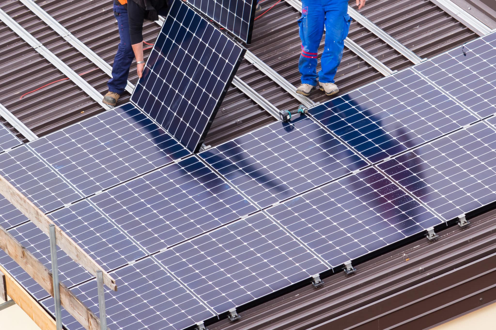 Installation of solar panels on a roof