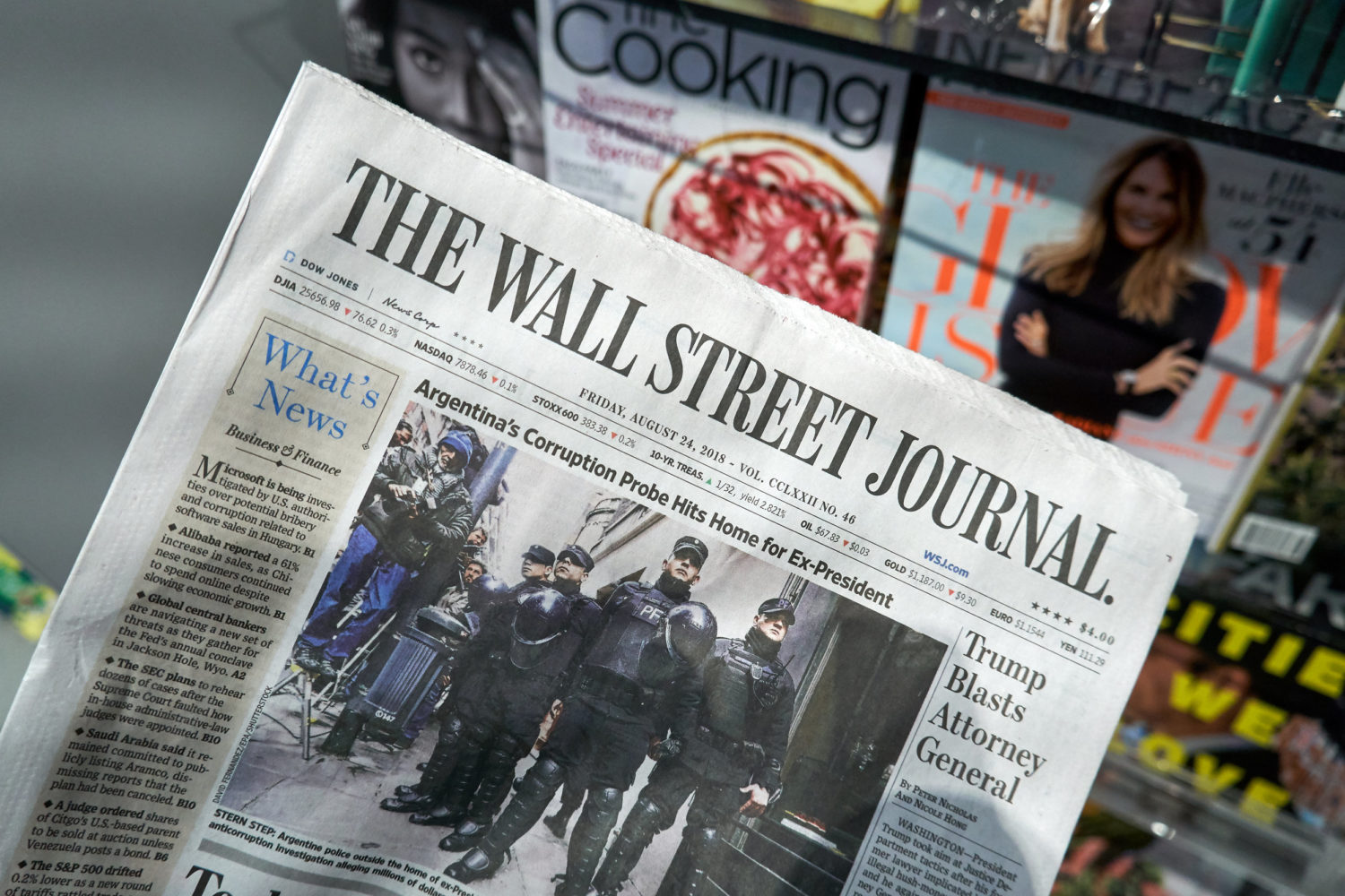 The Wall Street Journal newspaper in a hand
